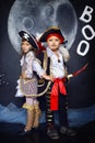 Boy and girl in pirate costumes. Halloween Concept Royalty Free Stock Photo