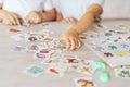 Boy and girl play educational games at school desk