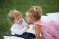 Boy and girl play on summer day outdoor Royalty Free Stock Photo