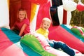 Boy and girl playing in the amusement park