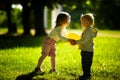 Boy and girl playing with ball Royalty Free Stock Photo