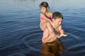 A boy and a girl playing on the beach during the summer holidays.  Happy kids on summer vacation Royalty Free Stock Photo