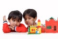 Boy and girl playing with blocks