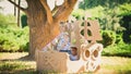 Boy and girl playing in a cardboard boat Royalty Free Stock Photo