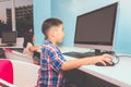 Boy and Girl playing with a computer Royalty Free Stock Photo