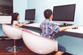 Boy and Girl playing with a computer Royalty Free Stock Photo