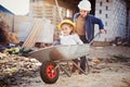 Boy and girl playing on construction site Royalty Free Stock Photo