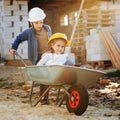 Boy and girl playing on construction site Royalty Free Stock Photo
