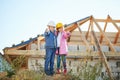 Boy and girl playing on construction site Royalty Free Stock Photo
