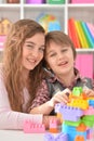 Boy and girl playing lego game Royalty Free Stock Photo