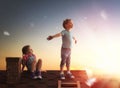 Boy and girl playing on the roof Royalty Free Stock Photo