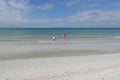 Boy and girl playing in the water at St. Pete Beach, Florida, USA Royalty Free Stock Photo