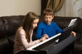 Siblings' Cozy Piano Time