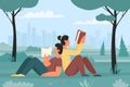 Boy and girl relaxing and reading books in park