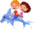 Boy and girl riding a dolphin Royalty Free Stock Photo