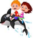 Boy and girl riding orca