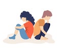 Boy and girl are sad teens. Depressed sad teens are sitting on the floor. Depressed teens. A quarreling girl and guy are