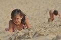 Boy and girl siblings in the dunes. The sand in the desert in the Slowinski National Park, Tourism. Royalty Free Stock Photo