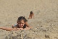 Boy and girl siblings in the dunes. The sand in the desert in the Slowinski National Park Royalty Free Stock Photo