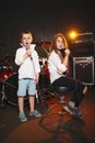 Boy and girl singing in recording studio Royalty Free Stock Photo