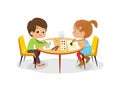 Boy and Girl sit at the round table and draw picture with watercolor and pencils. Drawing activity in the art class. Boy Royalty Free Stock Photo