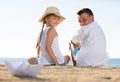 Boy and girl sitting beach Royalty Free Stock Photo