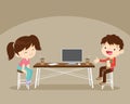 Boy and girl sitting work table