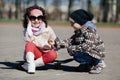 Boy and girl skating on the street Royalty Free Stock Photo