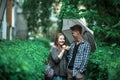 Boy and girl standing under an umbrella on the street. Royalty Free Stock Photo