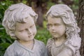 Boy and Girl Statue Faces Royalty Free Stock Photo