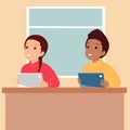 Boy and girl students are sitting at their desks with tablets.Vector flat illustration. Royalty Free Stock Photo