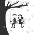 Boy and girl on a swing ride together. Royalty Free Stock Photo