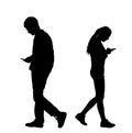 Boy and girl talking and watch on phone, separated with their back to back vector silhouette.