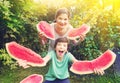 Boy and girl teen have fun eating water melon Royalty Free Stock Photo