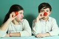 Boy and girl with tomato nose close up photo Royalty Free Stock Photo