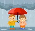 Boy and girl with umbrella standing under rain Royalty Free Stock Photo