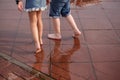 Boy and girl, vacation, together, puddles, rain