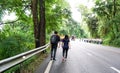 Boy And Girl Walk On Road