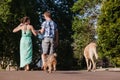 Boy Girl Walking Away Talking Dogs Royalty Free Stock Photo