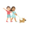 Boy And Girl Walking The Dog Together Royalty Free Stock Photo