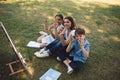 Group of children with teacher in park