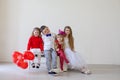 Kids boy and girls with red balloons Royalty Free Stock Photo