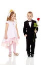 The boy gives the girl a flower. Royalty Free Stock Photo