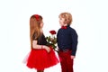 The boy gives the girl a rose gift Royalty Free Stock Photo