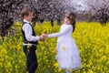 boy giving girl flowers Royalty Free Stock Photo