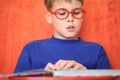 Boy reading a book intently Royalty Free Stock Photo