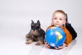 The boy, globe and a dog Royalty Free Stock Photo