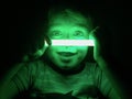 Smiling boy with glow stick Royalty Free Stock Photo