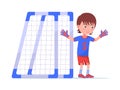 Boy goalkeeper stands next to the football goal