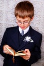 Boy going to the first holy communion Royalty Free Stock Photo